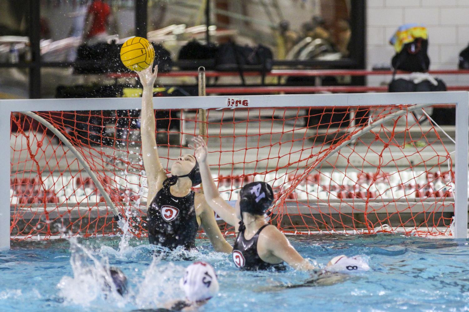 <a href='http://c.bodymystic.com'>BETVLCTOR伟德登录</a> student athletes compete in a water polo tournament on campus.